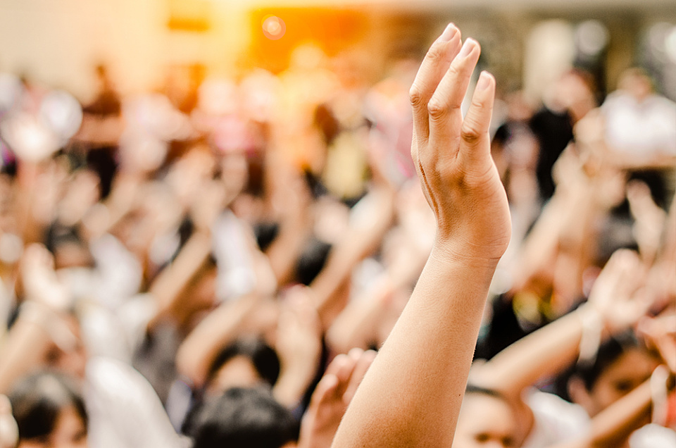 AGM raising hands vote shutterstock 786429082